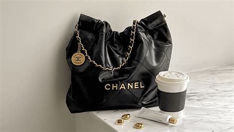 black chanel handbag with white logo|where to buy chanel 22.